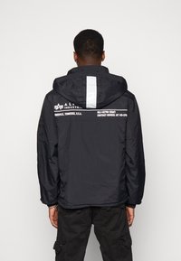 Alpha Industries Allvädersjacka - black
