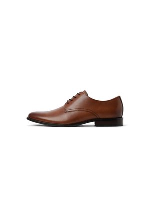 Brown leather dress shoe with a rounded toe, five eyelet lace-up design, subtle stitching details, and a low black heel.