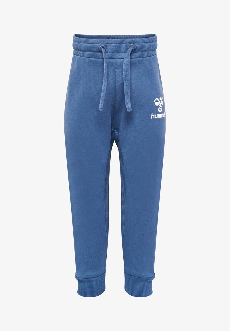 Blaue Jogginghosen aus weichem Stoff mit einem elastischen Taillenbund, Kordelzug und schmal zulaufenden Bündchen. Mit einem weißen Logo an der Seite.