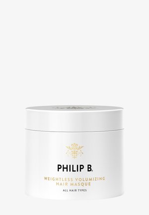 Récipient blanc du Masque Capillaire Volumisant Légèreté Philip B pour tous types de cheveux, avec un logo décoratif doré sur le couvercle et l'étiquette avant.