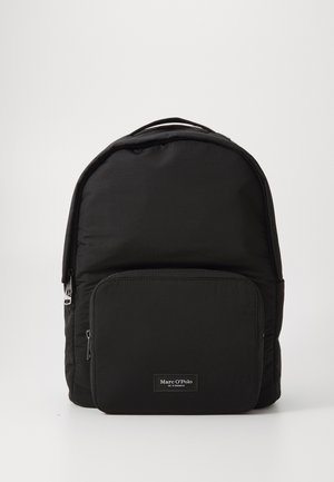 Black nylon backpack with a rounded shape, featuring a front zip pocket and a logo patch. Smooth texture and durable, simple design.