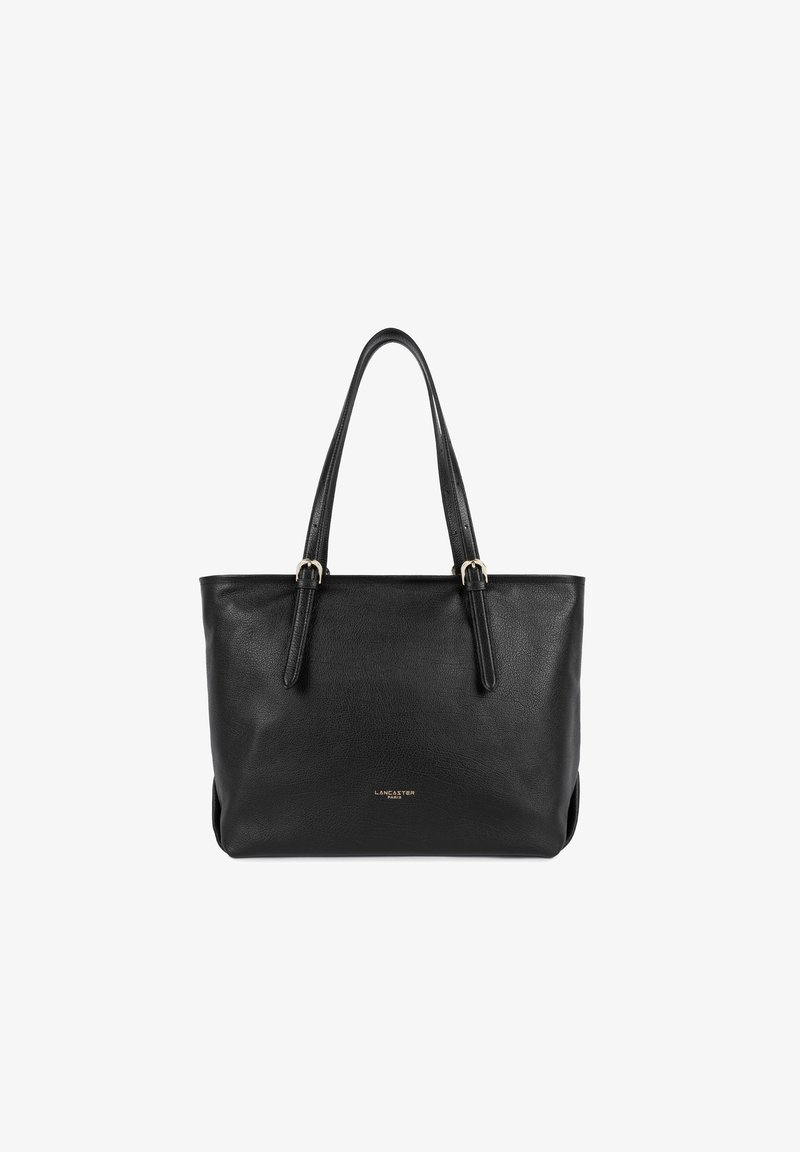 Schwarze Leder-Tote mit zwei langen Griffen, glatter Textur und goldfarbener Markenprägung auf der Vorderseite. Einfaches Design, rechteckige Form.