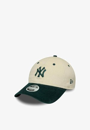 Beige corduroy cap with a dark green visor, featuring an embroidered NY logo on the front and a size tag on the brim.