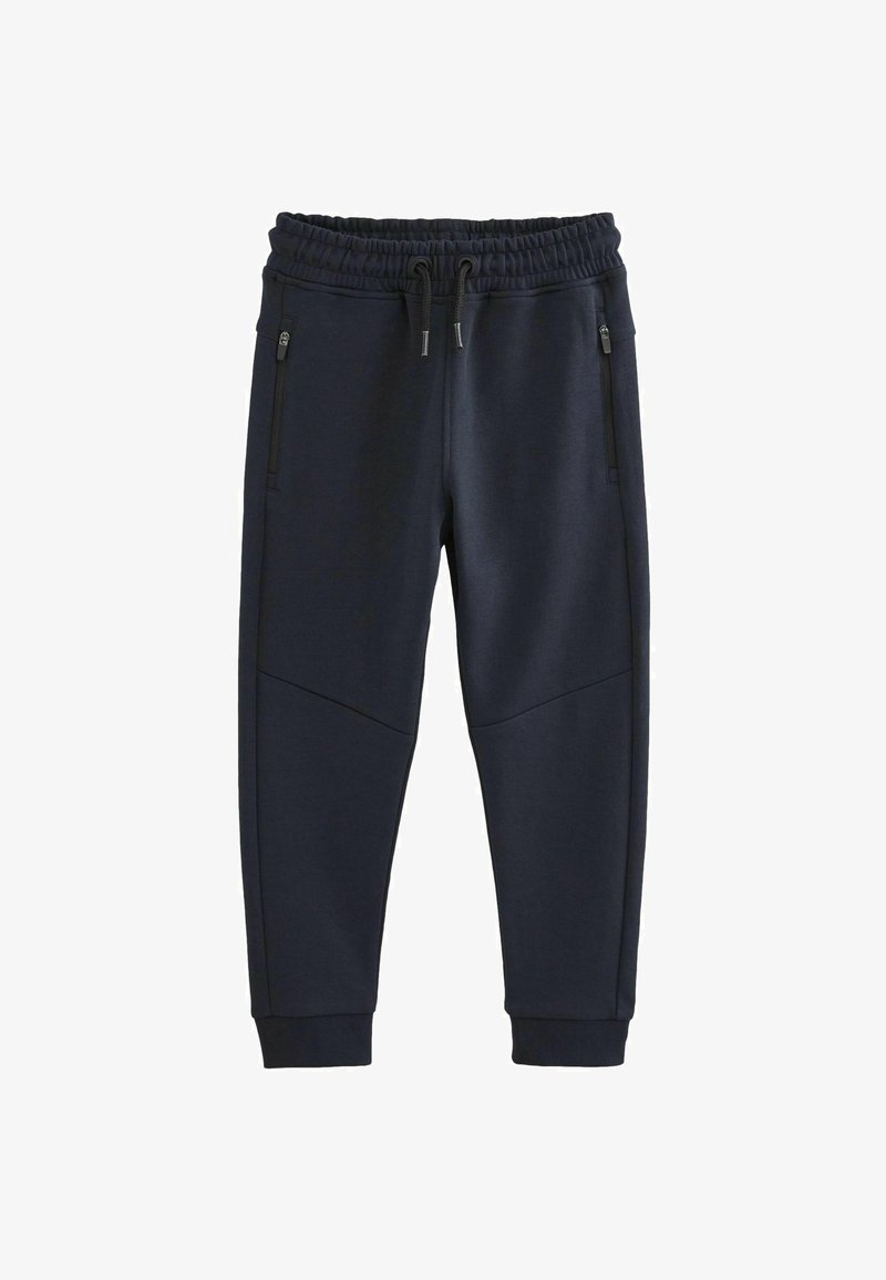 Navy joggers lavet af blødt stof, med elastisk talje og snøre, sidelommer med lynlås og tapered ankler.