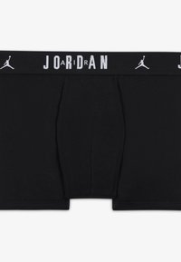 Črne moške spodnje hlače z oprijetim krojem, bombažni material, elastičen pas s tekstom in logotipom "JORDAN", brez dodatnih vzorcev ali podrobnosti.