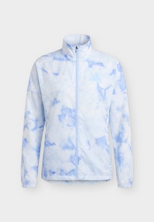 Veste zippée à motif tie-dye bleu clair et blanc avec col montant et manches longues sur fond uni.