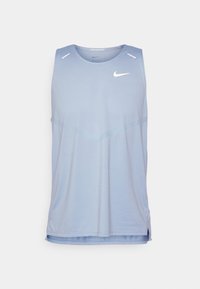 Nike sleeveless tank top in light blue, featuring a smooth texture, rounded neck, and white logo accents. Side slits at the hem.