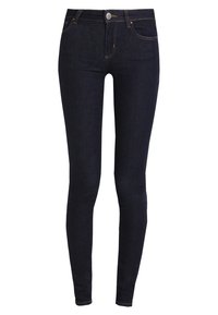 Kroppsnära jeans i mörk tvätt, med standard knäppning fram och dragkedja, fem fickor och diskreta sömdetaljer.