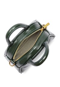 Green leather handbag with a glossy finish, zippered top, and dual rounded handles. Interior features a textured lining.