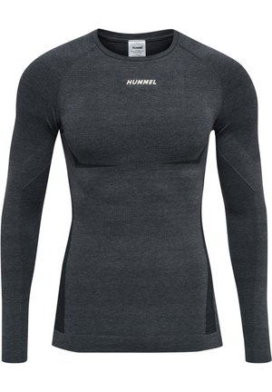 Long-sleeve athletic shirt in dark gray, featuring a textured fabric, fitted design, and a contrasting logo. Smooth, stretchy material.