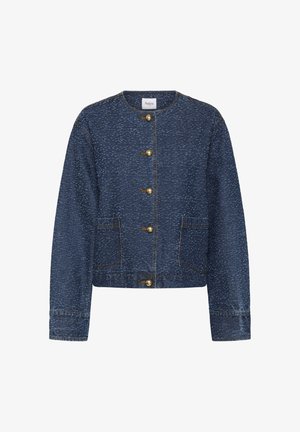 Sinine täpiline teksajakk ümmarguse kaelusega, ees viis kuldset nööpi ja kaks esimest taskut.