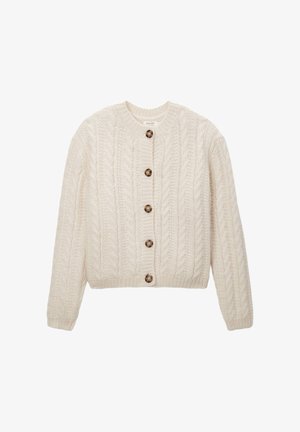 Cardigan tricoté couleur crème avec motif torsadé, encolure ronde et six boutons bruns sur le devant. Coupe courte.