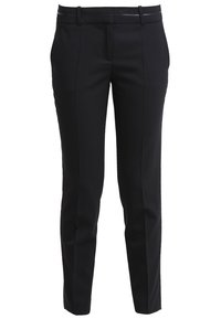 Pantalons noirs ajustés en tissu lisse, présentant une coupe slim, un design à jambe droite et une taille avec des accents discrets.