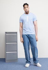 Alpha Industries PP T - Potiskana majica - light blue
