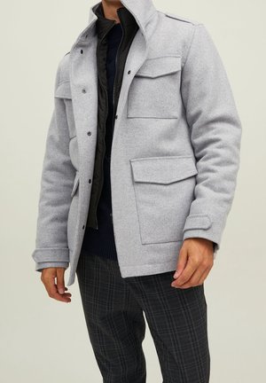 Jas - mottled light grey