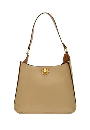 Beige leather handbag with a single brown shoulder strap and gold horseshoe-shaped clasp on front, curved rectangular shape.