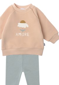 Peach-colored sweatshirt with flower graphic and "AMORE" text, paired with light blue striped leggings. Cotton blend fabric, casual fit.