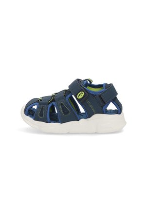 Sandalias infantiles de color azul marino con correas ajustables, con un diseño deportivo y suelas blancas, ideales para actividades de verano.