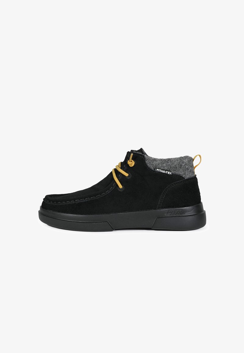 Black suede high-top shoes with gray felt lining, yellow laces, and black rubber sole. Features a stitched design and logo on the side.