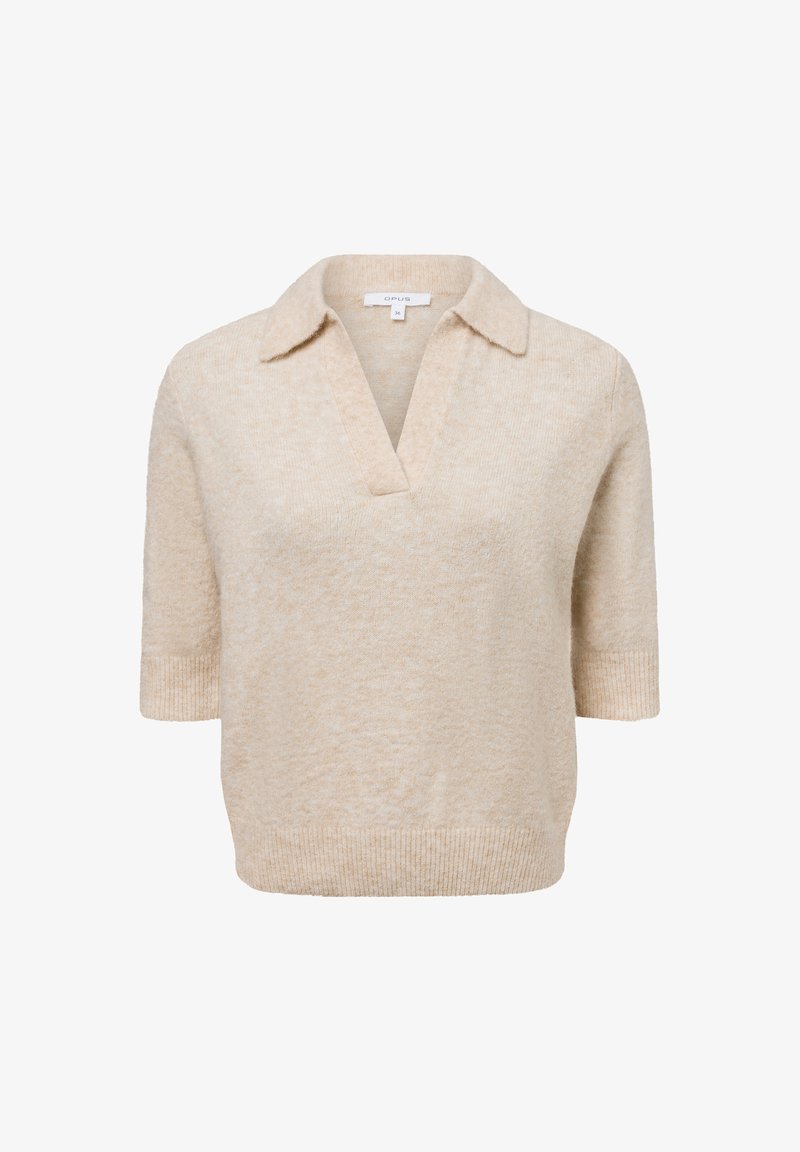 Pull-over en tricot beige à manches courtes avec un col en V et un col. Texture douce, coupe décontractée, avec des poignets et un ourlet côtelés.
