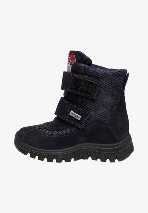 Children's black winter boot with two adjustable Velcro straps, rugged sole, and branded patches on straps and tongue.