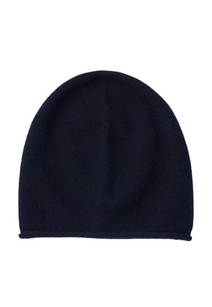 Bonnet noir tricoté uni avec un sommet légèrement arrondi et une texture minimale, présenté sur un fond blanc.