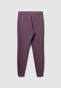 Lila Leggings aus weichem, dehnbaren Stoff. Mit einem hohen Bund, schmaler Passform und ohne sichtbare Hardware oder Verzierungen.