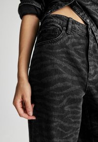 Next ZEBRA WIDE LEG   - Flared-farkut - washed black