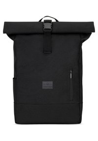 Black roll-top backpack with front zip pocket, plastic buckle closure, side pocket, and rectangular logo patch reading "Johnny Urban."