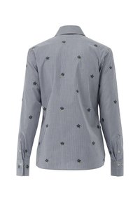 Long-sleeve shirt in blue and white stripes, embroidered with small palm trees. Features a classic collar and buttoned cuffs.