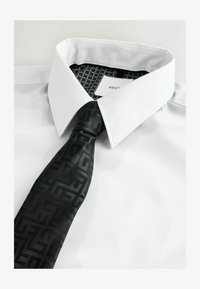 Valittu, white  black geometric