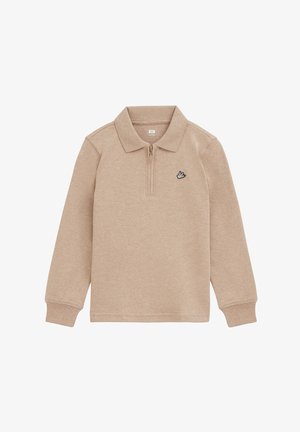 Beige polo met lange mouwen, een korte rits aan de voorkant en een klein zwart-wit vogel logo op de linkerborst.