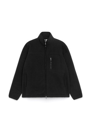 Black fleece jacket with a high collar, full zipper, and a chest pocket. Features textured fabric and side pockets for added functionality.