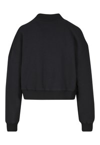 Sweatshirt noir court avec un col rond, des poignets et un ourlet côtelés, présentant une texture lisse et une coupe décontractée. Aucun détail avant visible.