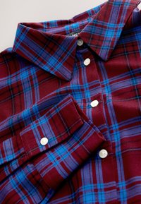 Non selezionato, red/blue check