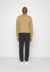 Scotch & Soda FINCH BLEND JOGGER - Stoffhose - deep sea
