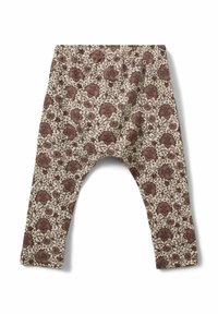Měkké béžové legíny pro malé děti s hnědým květinovým potiskem a elastickým pasem, rozložené na bílé pozadí.