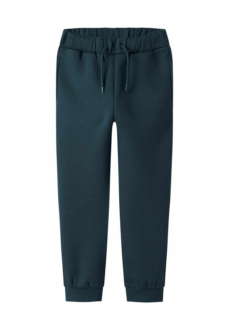 Mörkgröna joggerbyxor med elastisk midja, justerbar dragsko, sidofickor och ribbade muddarna vid anklarna.
