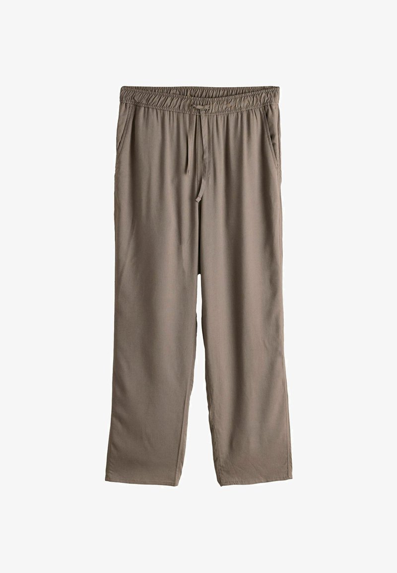 Pantalon ample taupe avec taille élastique, cordon de serrage et poches latérales, présenté à plat sur fond blanc.
