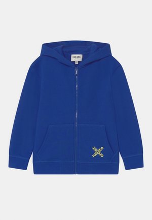 Vetoketjullinen college - blue