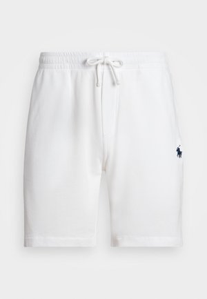 Biele bavlnené šortky s elastickým pásom a šnúrkou, s malým námorníckym logom na ľavom stehne. Mäkkučký materiál, voľný dizajn.