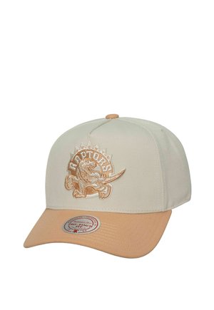 Beige und braune Baseballkappe mit besticktem Dinosaurier-Logo und „Raptors“-Schriftzug auf der Vorderseite, mit gebogenem braunem Schirm und Aufkleber oben.