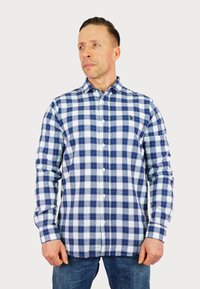 Camicia a quadri blu e bianca con maniche lunghe, colletto a bottoni e tessuto testurizzato. Presenta un logo sottile sul petto.