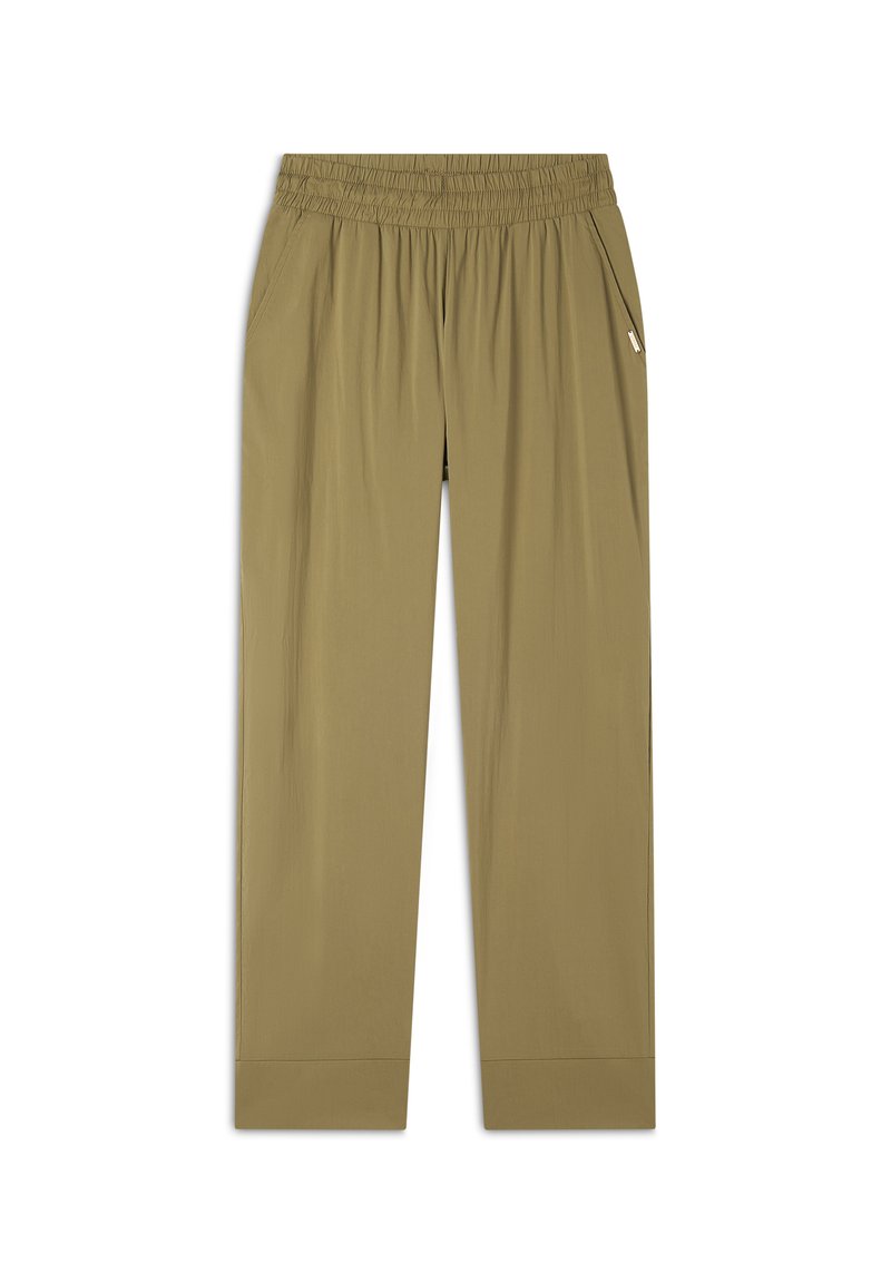 Pantaloni beige con vita elastica e vestibilità affusolata. Presentano tasche laterali e una texture liscia e leggera. Nessun motivo o decorazione visibile.