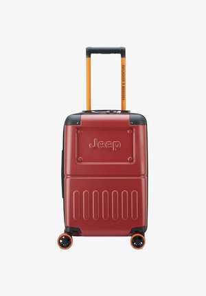 Valigia rigida rossa con dettagli neri, manico arancione e ruote. Presenta il logo "Jeep" e un design con pannello testurizzato. Ideale per i viaggi.