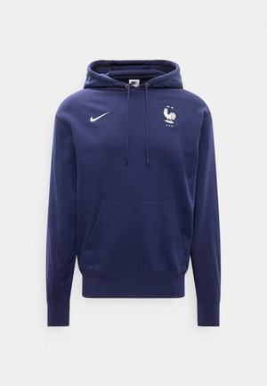 Marineblå hættetrøje med forlommer, Nike-logo på højre bryst og hvidt haneemblem med to stjerner på venstre bryst.