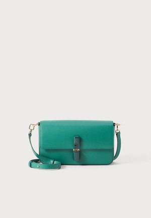 Teal leather crossbody bag with a textured surface, magnetic closure, and a detachable shoulder strap. Features a simple, rectangular shape.
