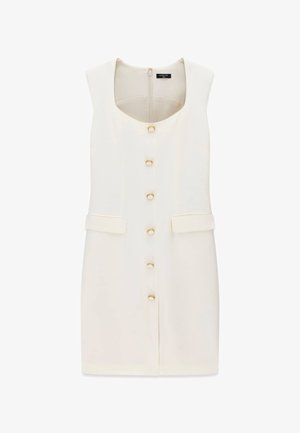 Ärmelloses weißes Kleid mit einem Rundhalsausschnitt, sechs goldenen Knöpfen entlang der Vorderseite und zwei aufgesetzten Klappentaschen vorne.