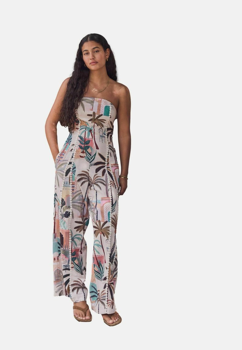Stropeløs jumpsuit i let stof med et tropisk palmeprint i brun, teal og pink. Løs pasform med sidelommer og brede ben.