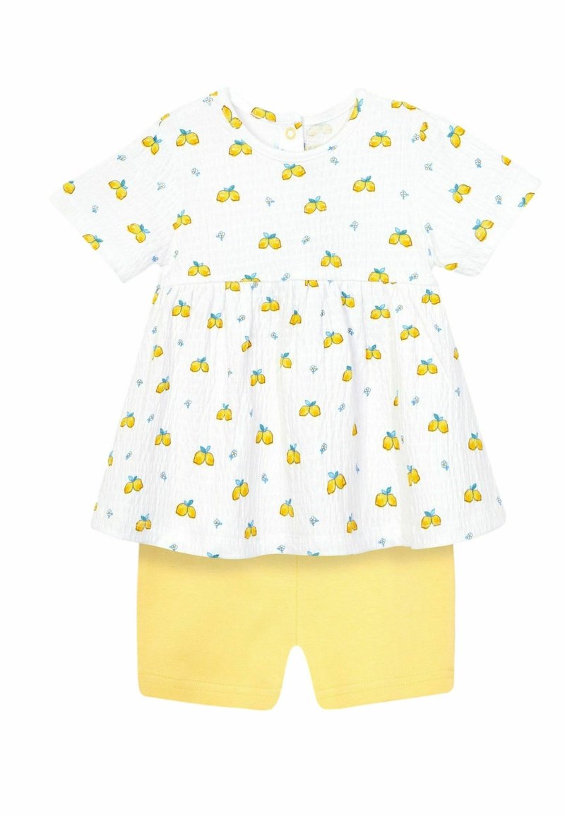 Robe bébé blanche à manches courtes avec imprimé citron jaune, associée à un short jaune uni.
